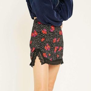 UO Lucy Lace Trimmed Mini Slip Skirt